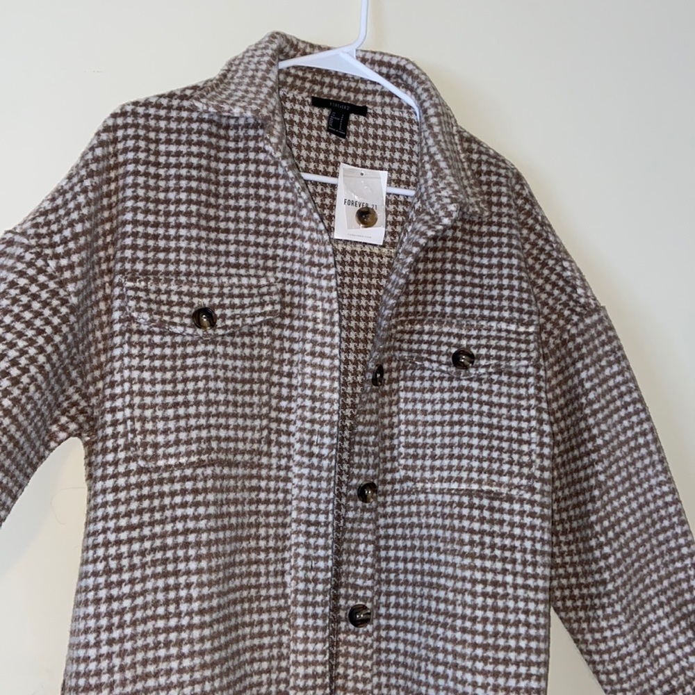 A tan/brown plaid shacket